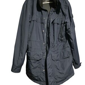 The North Face McMurdo Parka or a  heavy-duty winter 550 DRYVENT Large Size Blue